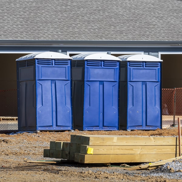 what is the cost difference between standard and deluxe porta potty rentals in Sparta NC